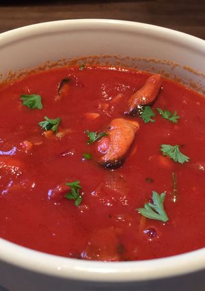 A picture of Smoked Mussels In Tomato Soup.