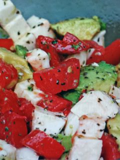 A picture of AVOCADO/ TOMATO/ MOZZARELLA SALAD.