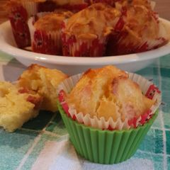 A picture of Cheesy muffins with salami (or ham).