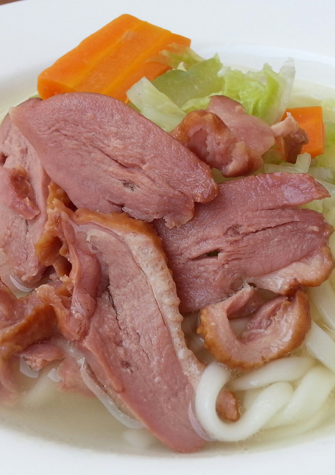 A picture of Udon Noodle With Smoked Duck.