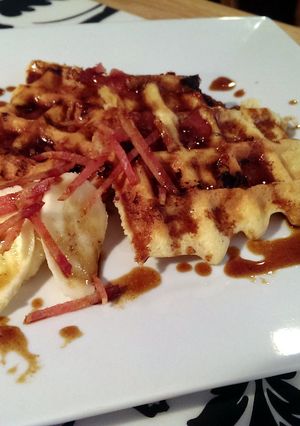 A picture of Bacon Banana Beer Gluten Free waffles & Bourbon Brown Butter Caramel Sauce.