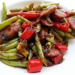 A picture of Green Bean And Sausage In BBQ Sauce.