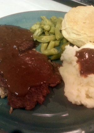A picture of Salisbury Steak.