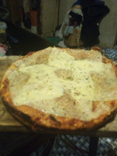 Una foto de Pizza