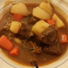 A picture of Five Spice Braised Beef with Daikon and Carrot.