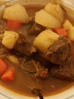 A picture of Five Spice Braised Beef with Daikon and Carrot.