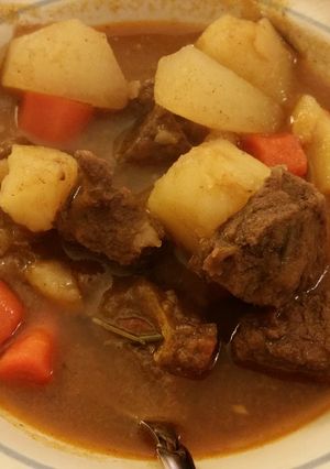 A picture of Five Spice Braised Beef with Daikon and Carrot.