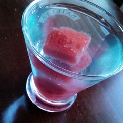 A picture of Blue Little Hugs Barrel Cocktail.
