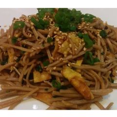 A picture of Soba - Oriental noodles with scallions.