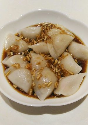 A picture of Boiled Dumplings with Sweet and Tangy Yurinchi Sauce.