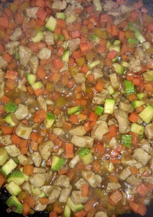 A picture of carla's chicken fried rice with eggs.