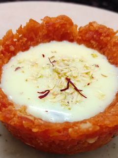 A picture of Gajar halwa cups with rabdi.