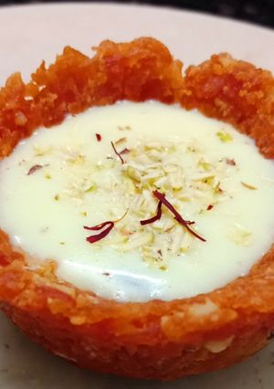 A picture of Gajar halwa cups with rabdi.