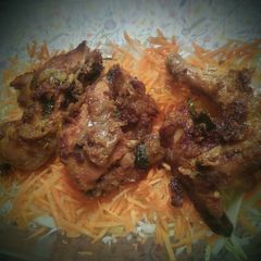 A picture of Oven chicken with salad.
