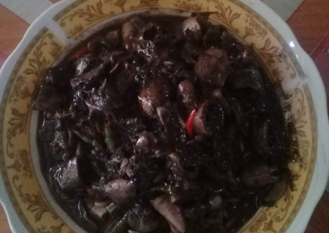 Cumi osenga dengan saus hitam