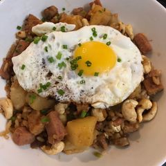 A picture of Triple pork, pineapple and cashew fried rice 🍚 🐷🍍.