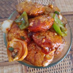 A picture of Chilli egg appam     .