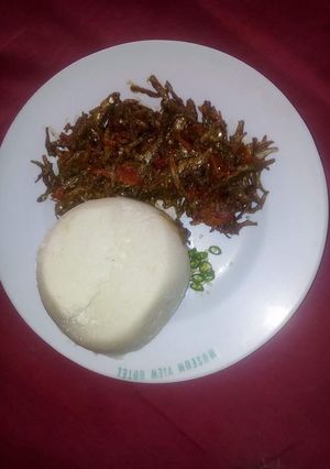 A picture of Fried Omena with Ugali.