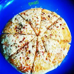 Full loaded cheese pizza A picture of Full loaded cheese pizza.