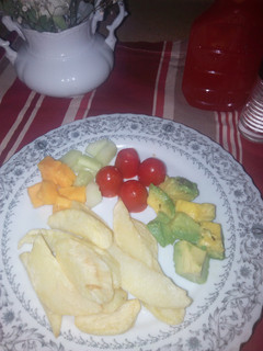 A picture of Avocado Salad and Chips.