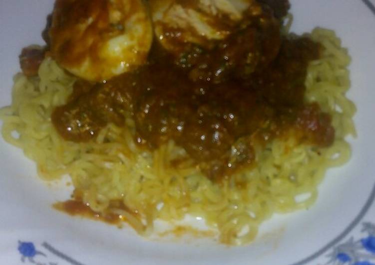 Egg curry with noodles