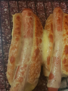 Una foto de Panchos con muzzarella rápidos y ricos
