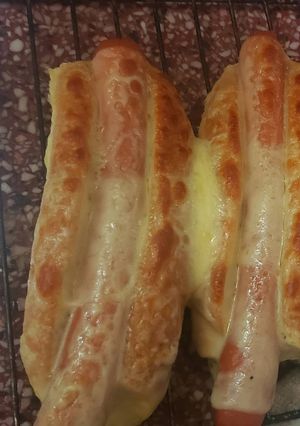 Una foto de Panchos con muzzarella rápidos y ricos