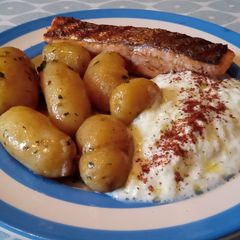 Griddled Salmon with Jersey Royals in Minted Butter & Tzatziki A picture of Griddled Salmon with Jersey Royals in Minted Butter & Tzatziki.