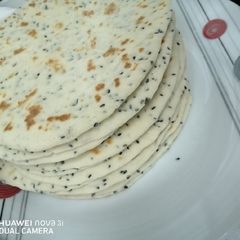 A picture of Saj Kubus with Black pill seeds.