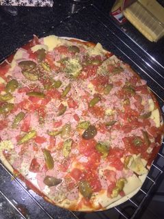 Una foto de Pizza jamón