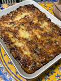 Gratin d'aubergines au porc, tomates et emmental