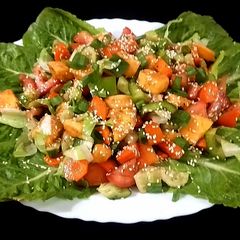 A picture of Mango salad with pomegranate molasses dressing.