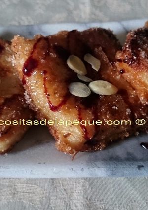 Una foto de Leche frita con leche de almendras y reducción de Oporto