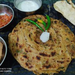 A picture of Yummy and Spicy Dhaniya Paratha(Satpuda paratha).