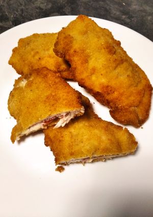 Una foto de Libritos de jamón dulce, queso y cherrys, con orégano