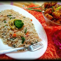 A picture of Gobhi Manchurian with Veg Fried Rice.