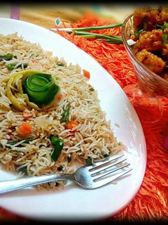 A picture of Gobhi Manchurian with Veg Fried Rice.