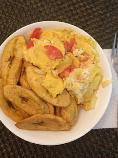 A picture of Fried unripe plantain with fried egg.