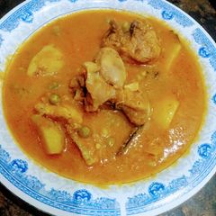 A picture of Chicken Matar Aloo ka Salan.