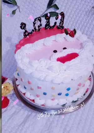 صورة لوصفة كيكة بابا نويل محشية بالفاكهة