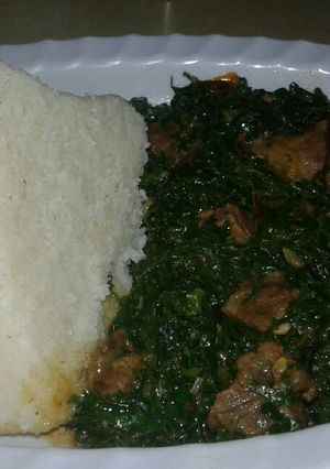 A picture of Ugali/ beef spinach.