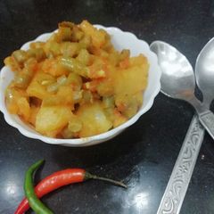 A picture of Green beans with potato.