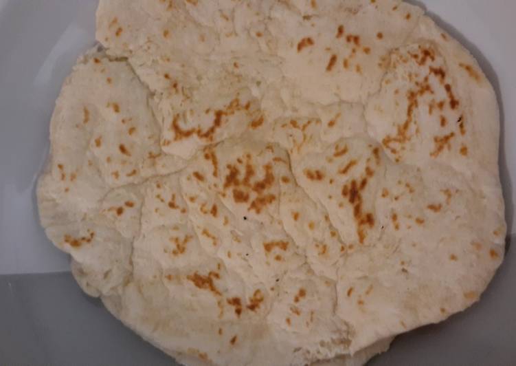Naan bread (?) Tortilla (?)