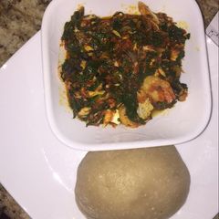 A picture of Efo riro with fish and shrimps.