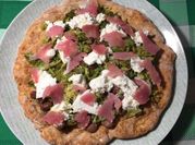 Una foto di pizza condimento