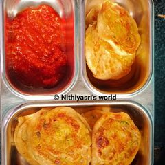 A picture of Pin wheel Aloo Paratha with Homemade Tomato Sauce.