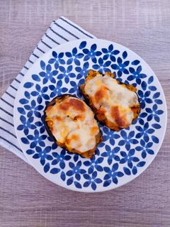 Una foto de Berenjenas rellenas de calabaza y tofu
