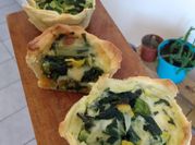 Una foto de canastitas de zapallito verde