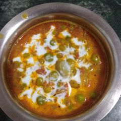 A picture of Matar masroom ki sabji.