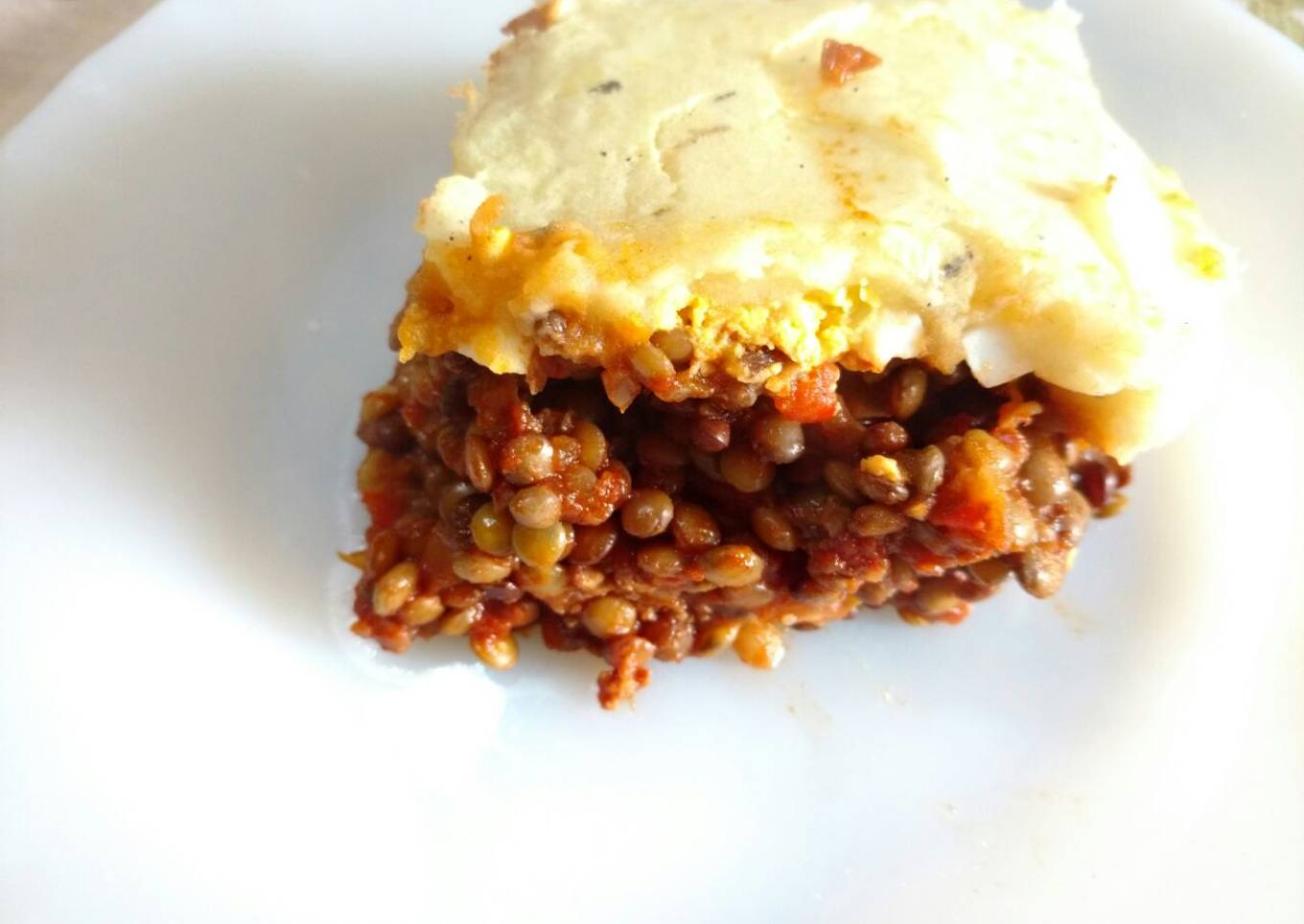 Pastel de papas con relleno de lentejas